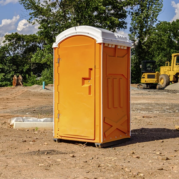 how often are the porta potties cleaned and serviced during a rental period in Benge